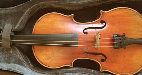 if there is something else besides the instrument in the photo